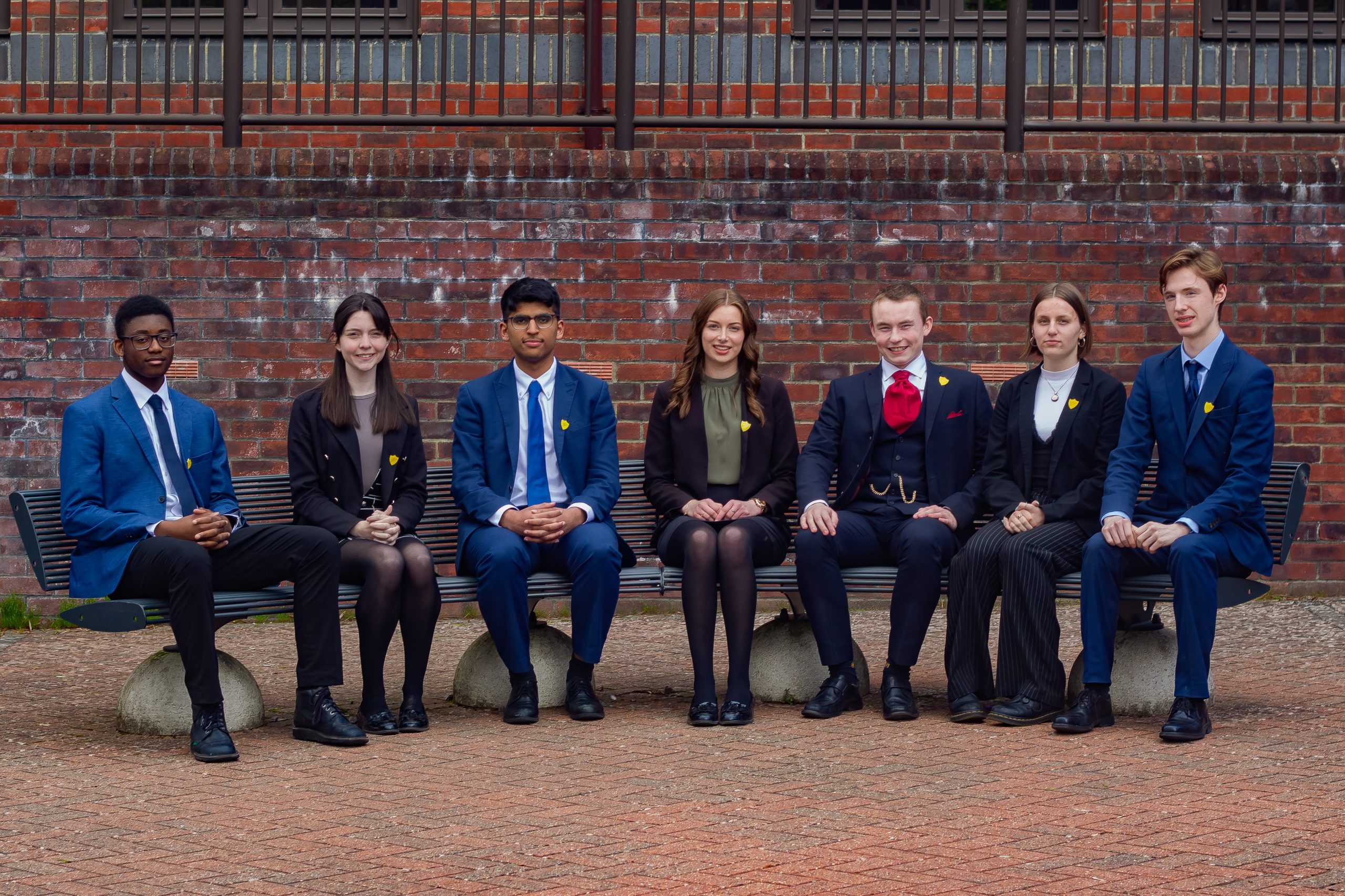 Sixth Form students in formal dress